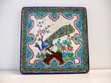 "LONGWY" Dessous de Plat en émaux. Début 20ème siècle. A décor de paon.