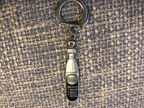 Porte clés années - 60/70,