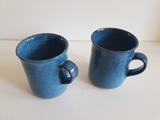 Lot 2 tasses en céramique
