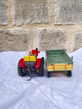 Tracteur et remorque en tôle