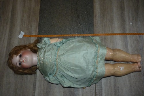 Antique porcelain head doll
