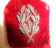 Insigne brodé en cannetille