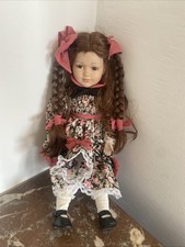 Poupée tête en porcelaine