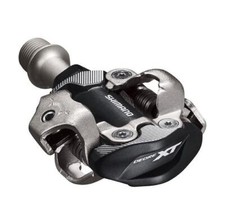 Paire de pédales vtt automatique marque Shimano xt m8100 spd grise avec cales
