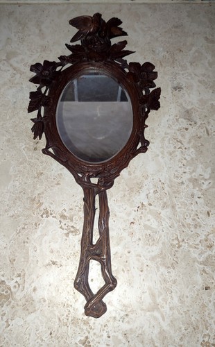 Miroir face main foret - face, à