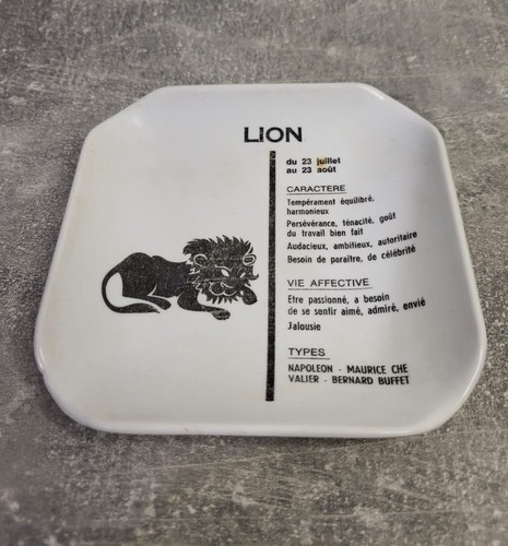 Ancien ramasse monnaie lion - monnaie,