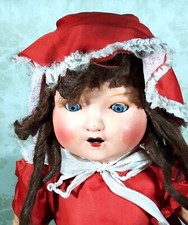 Rare poupée pleureuse en carton bouilli peint. Années 1940.