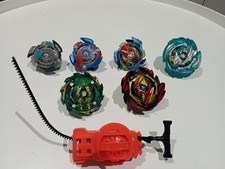Lot toupies beyblade avec lanceur