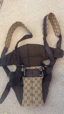 porte bebe GUCCI authentique très bonne état .