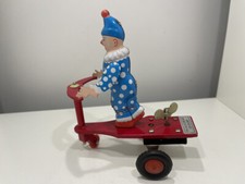 Jouet en tôle clown 12 x 13