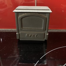 ancienne tirelire poele en