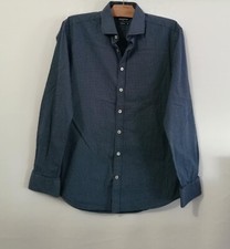 Chemise bleue à pois fins