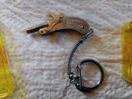 Porte cle pistolet - porte,