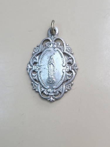 Médaille lourdes art - n, de