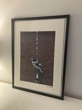 lithographie banksy avec certificat et encadrée 