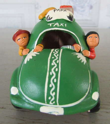 Taxi miniature argile - en,