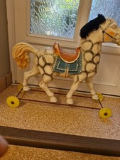 cheval sur roulettes en