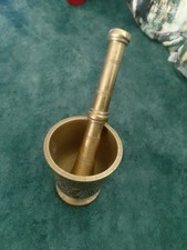 mortier et son pilon en bronze