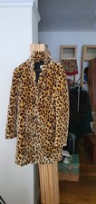 Manteau léopard neuf taille