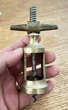 antique  tire bouchon en bronze