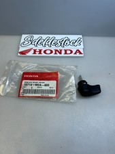 1 bouton porte casque honda