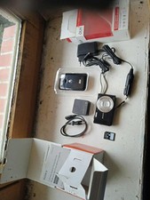 lot appareil photo numerique avec chargeur + carte memoire + barbecue a charbon