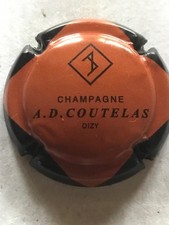 A SAISIR   CAPSULE DE CHAMPAGNE.  COUTELAS.  N 1a. ORANGE MARRON.