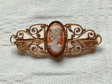 Bijou ancien : broche , camée , coquillage.