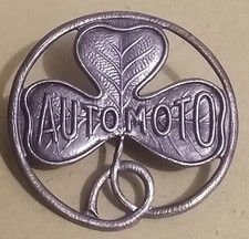 ancien badge de la marque de