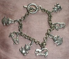 Bracelet en métal argenté à mailles style jaseron & breloques : chats et oursons