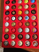 PLATEAU AVEC 40 CAPSULES DE CHAMPAGNE+ 1 AMOUR DE DEUTZ OR 2014