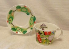 "Hole In One" cup and saucer