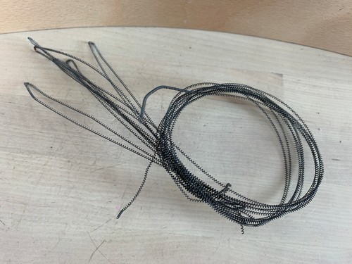 Strand wound spring - wound, snare
