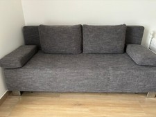 Canapé-lit gris avec fonction couchage