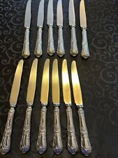 12 couteaux métal argenté avec poinçon lame inox 