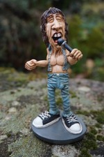 841.3771  FIGURINE MUSICIEN