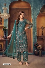 Costume droit brodé de fleurs de créateur en filet vert avec pantalon et...