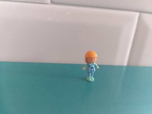 Polly pocket figurine doll