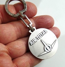Ancien porte cle métal FIA AIR TOTAL Aviation Avion.