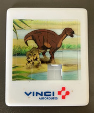 17 -  TAQUIN DINOSAURE - VINCI