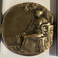 MÉDAILLE EN BRONZE PAR