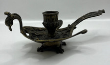 Rat de cave, Bougeoir à main