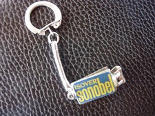 Ancien porte-clé coupe-ongles ISOVER SONOBEL. Années 60-70.