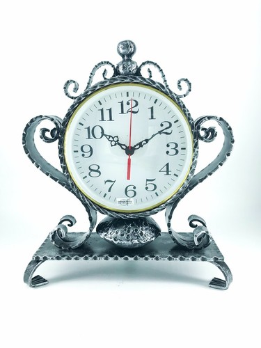 Horloge poser fer - poser, en