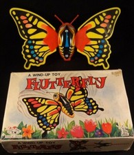 Ancien jouet papillon mécanique en boîte d'origine Nomura Toys tôle
