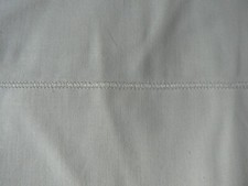 ANCIEN DRAP LISERE ROULE BLANC