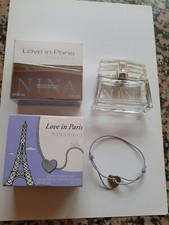 Flacon vide Love in Paris eau de parfum vaporisateur 30 ml + bracelet NINA RICCI