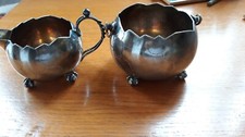 Vintage Wilcox silver plate gilt sugar and creamer with ball & claw feet