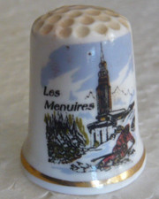 Dé à coudre de collection en porcelaine décoré de la station des Menuires