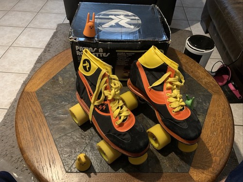 Patins à roulettes - à,